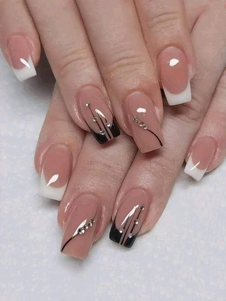 Nude acrylic nails with French tips and black line art